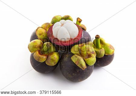 A Delicious Ripe Mangosteen On A White Background