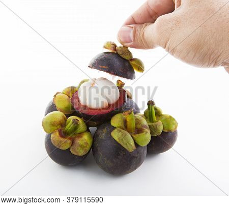A Delicious Ripe Mangosteen On A White Background