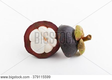 A Delicious Ripe Mangosteen On A White Background