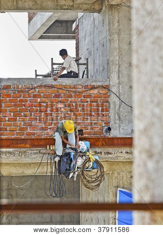 Man Servicing Repairing Equipment