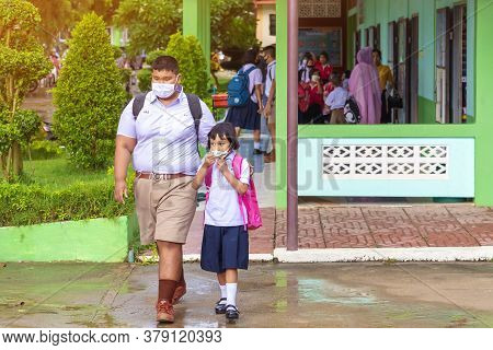 Kanchanaburi,thailand-july 2,2020:thai Students Wear Various Medical Masks To Prevent Themselves Fro