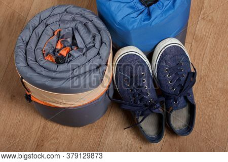 Tourist Equipment. Self-inflating Rugs And Sneakers. Lie On The Floor In The Room.