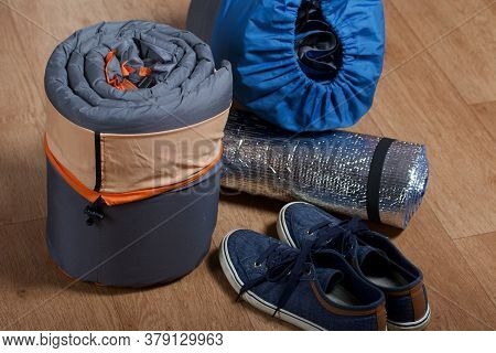 Tourist Equipment. Self-inflating Rugs And Sneakers. Lie On The Floor In The Room.