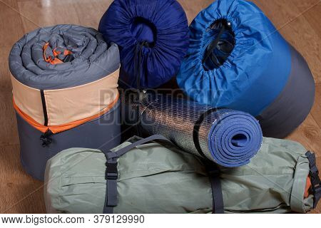 Tourist Equipment. Self-inflating Rugs And Sneakers. Lie On The Floor In The Room.