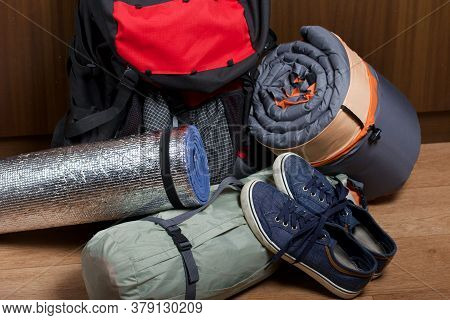 Tourist Equipment. Self-inflating Rugs And Sneakers. Lie On The Floor In The Room.