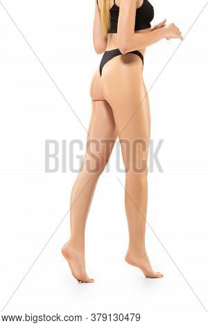 Feminine. Beautiful Female Legs And Buttlocks Isolated On White Background. Beauty, Cosmetics, Spa, 