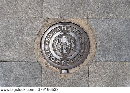 Salamanca, Spain, July 2020 - Iron Manhole Cover For Firemen (translation Of Bomberos) In The City O