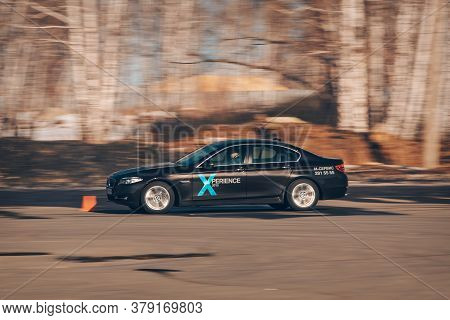 Bmw Advertising, Moscow, 1.11.2018: Demonstration Of A Model Of A Black Car, Cars On A Test Track, D