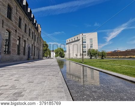 MECHELEN, BELGIUM - June 2020: The reconverted Tinel park witth the Predikheren monastery and the Kazerne Dossin museum