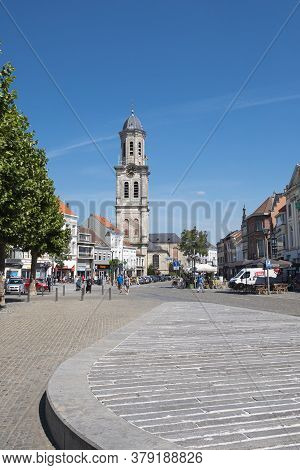 Lokeren, Belgium, July 13, 2020, People Walking On The Square In Lokeren With The Saint Laurentius C