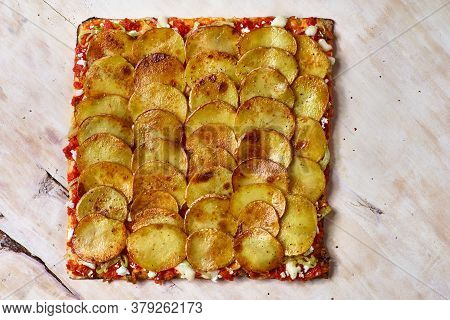 Tart Flambe Or Flammkuchen On Wooden Cutting Board, Traditional Alsatian Pie, Rustic Style, Top View