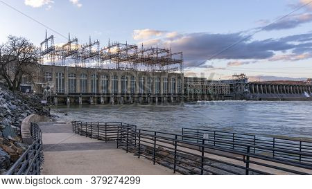 A Blue And Purple Cloud-filled Sky Hangs Over The Conowingo Dam, Which Crosses The Susquehanna River