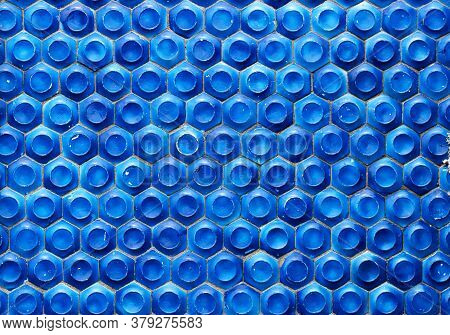 Mosaic Of The Soviet Period In The Form Of Honeycombs On A Concrete Wall.