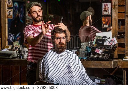 Man Hairstylist. Beard Man In Barbershop. Hairstylist Serving Client At Barber Shop, Bearded. Hairdr