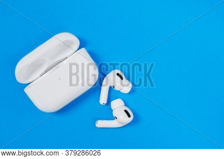 Rostov, Russia - July 06, 2020: Wireless Headphones Apple Airpods Pro In Opened Charging Case With A
