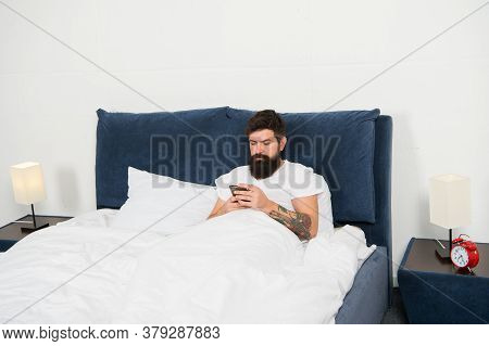 Check Email. First Of All. Bearded Man Texting Sms In Bed. Hipster Send Message Using Smartphone. Mo