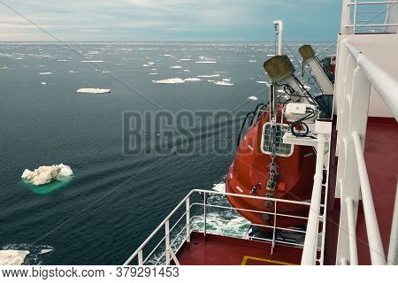 The Feed Of A Ship Sailing In The Arctic. Landscape Of The Arctic From The Deck Of The Tanker.