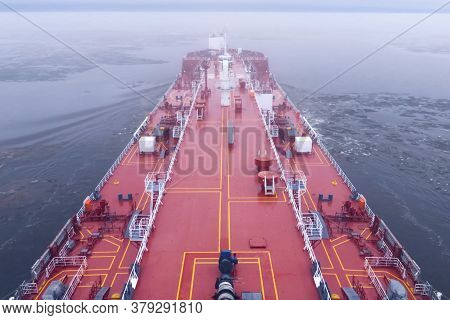 The Feed Of A Ship Sailing In The Arctic. Landscape Of The Arctic From The Deck Of The Tanker.