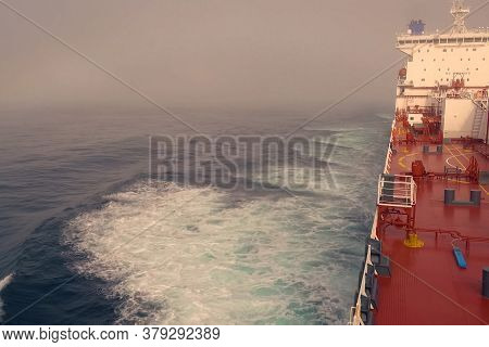 The Feed Of A Ship Sailing In The Arctic. Landscape Of The Arctic From The Deck Of The Tanker.