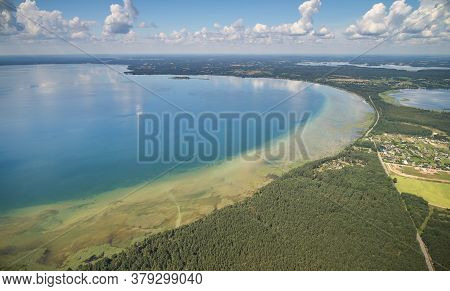 Big Lake In Forest Background