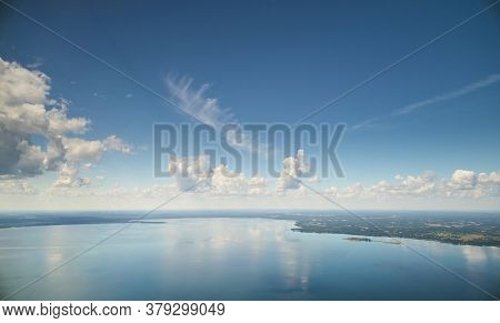 Blue Color Lake With Cloudscape