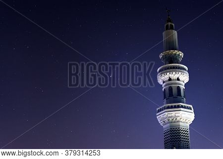 The Scenery Of The Neowise Comet Passes Through The Mosque Tower At Dusk In Chiang Rai, Thailand.