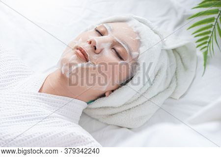 Beautiful Woman In The Spa Salon, Treatment Hyperpigmentation And Melasma On Face By Serum Mask, Fac