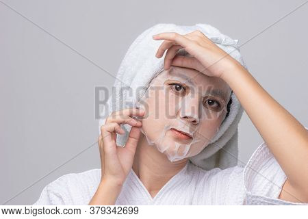 Asian Woman Facial Face Care, Treatment Hyperpigmentation And Melasma On Face By Serum Mask, Facial 