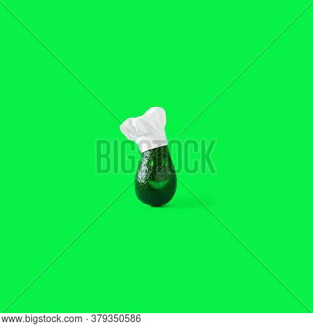 Finny Green Fresh Avocado, With Smile And Eyes On Face Wearing Clean White Restaurant Chefs Hat On G