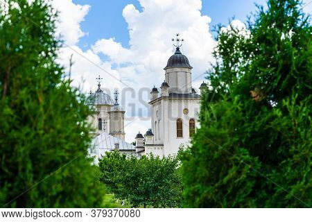 Pasarea Monastery, Orthodox Church Architectural Details. View Of Orthodox Church And Green Churchya