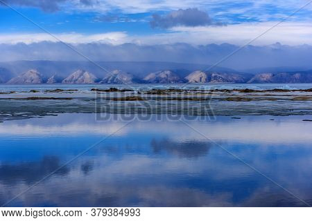Melting In May On Baikal Ice, And Clouds