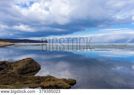 Melting In May On Baikal Ice, And Clouds