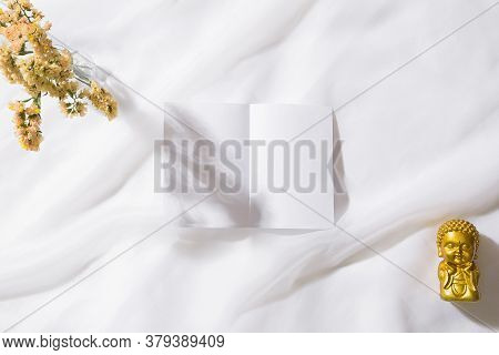 Top View Of Voile Fabric Background With Flowers In Two Corners With Space For Text