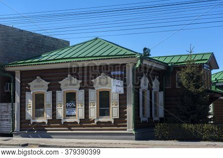Wooden Architecture Of Siberia. Wooden Houses On Streets In The Center Of Irkutsk