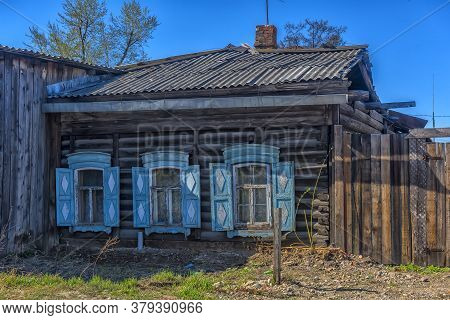 Wooden Architecture Of Siberia. Wooden Houses On Streets In The Center Of Irkutsk
