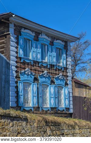 Wooden Architecture Of Siberia. Wooden Houses On Streets In The Center Of Irkutsk