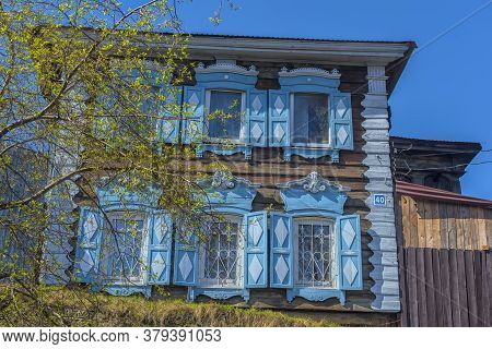 Wooden Architecture Of Siberia. Wooden Houses On Streets In The Center Of Irkutsk