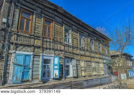 Russia, Irkutsk 06,05,2018 Wooden Architecture Of Siberia. Wooden Houses On Streets In The Center Of