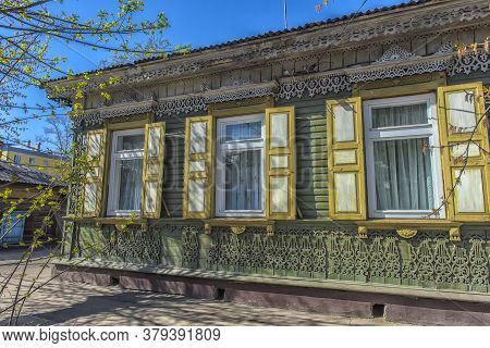 Russia, Irkutsk 06,05,2018 Wooden Architecture Of Siberia. Wooden Houses On Streets In The Center Of