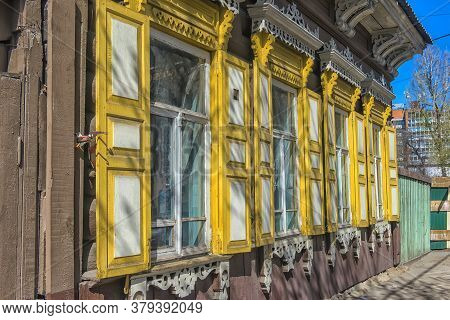 Russia, Irkutsk 06,05,2018 Wooden Architecture Of Siberia. Wooden Houses On Streets In The Center Of