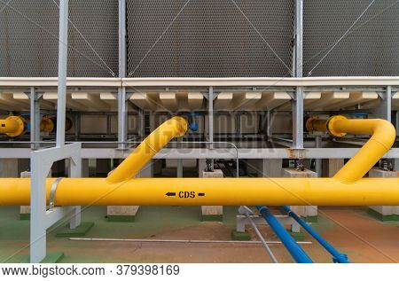 Chiller Tower Or Cooling Tower On Rooftop Of A Office Building. System Work. Architecture Machine. C