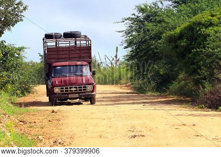 Conceição Do Coite; Bahia; Brazil; 07/30/2020. Old Truck Walking On A Clay Road In The Interior Of B