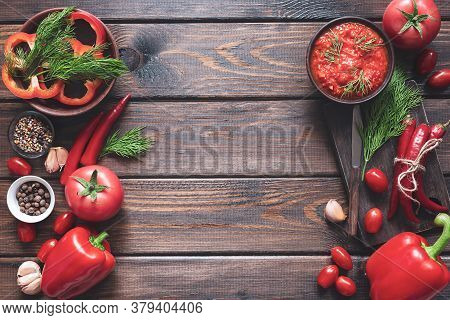 Balkan Sauce Ajvar And Ingredients For Its Preparation On A Wooden Table With A Copy Space. Serbian 
