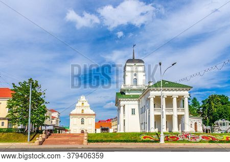 Town Hall Building On Freedom Svabody Square And Church Of St. Joseph In Upper Town Minsk Historical