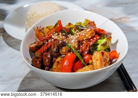 Chinese Shrimp With Mixed Sauteed Vegetables In A Brown Garlic Sauce