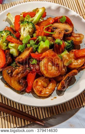 Chinese Shrimp With Mixed Sauteed Vegetables In A Brown Garlic Sauce