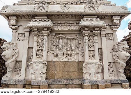 Wall Of Ancient Indian Kailasa Temple (vii Century) With Sculptures Of Gods Shiva And Parvati And Th