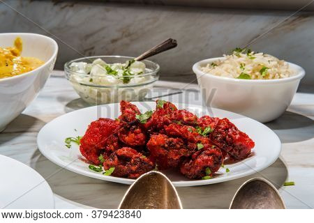 Indian Dinner Fried Mushroom 65 With Raita And Basmati Rice