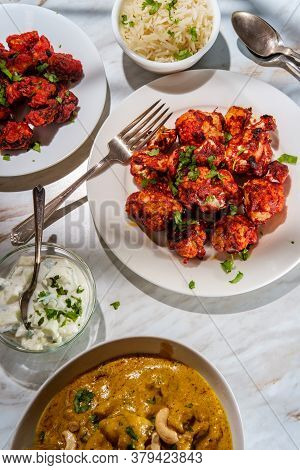 Indian Dinner Korma With Mushroom 65 Tandoori Cauliflower Rice And Raita