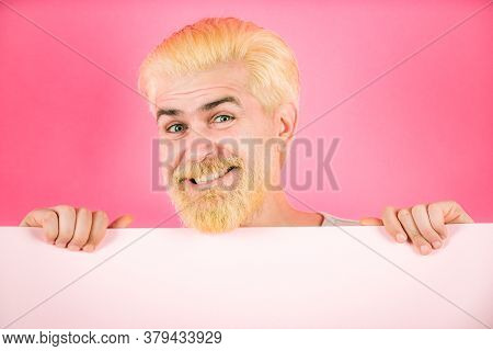 Smiling Man Holding Empty Blank Paper Board With Copy Space For Text. Blank, Empty Paper, Billboard 